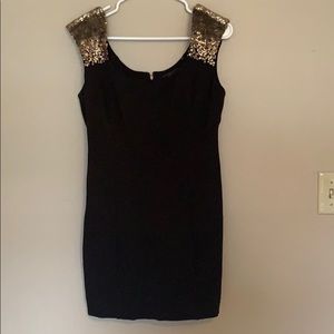 Black Guess dress with gold sequined shoulders